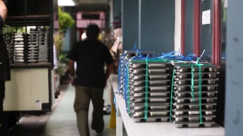 Indonesia to reduce free meal program days amid energy cost pressures, INDONESIA Stock Footage 331841642