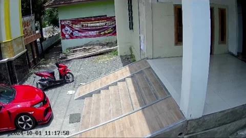 Indonesia: Security camera captures fall in Central Java Stock Footage 290370735