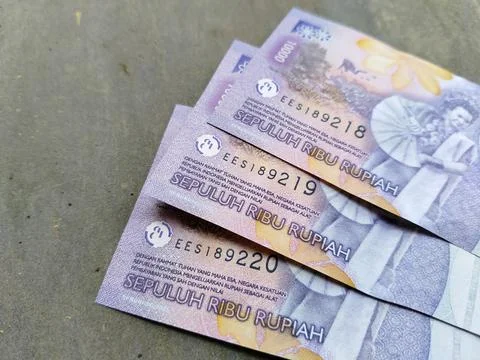 An Indonesian 10,000 rupiah banknote emphasizing national currency, financial  Stock Photos
