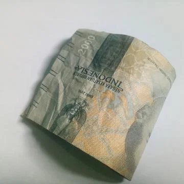 Indonesian 2000 banknote on a white background 3 Stock Photos