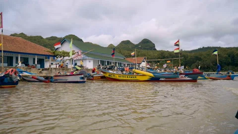 Indonesian boats with flags Video stock 87828457