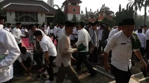 Indonesian community unites in prayer fo... | Stock Video | Pond5