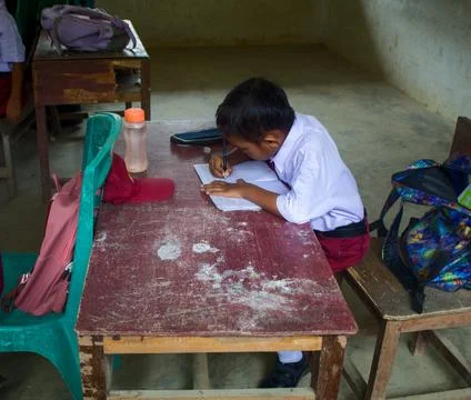 Indonesian elementary school students study in class. Stock Photos