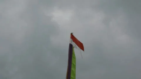 Indonesian flag, red and white with sky background Stock Footage 308931924