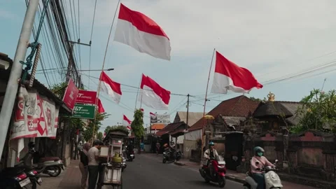 Indonesian flags displayed streets during Independence Day celebrations 動画素材 342843044
