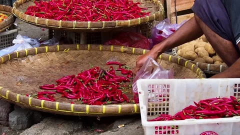 An Indonesian Man Is Choosing Vegetables Stock Footage 223467824