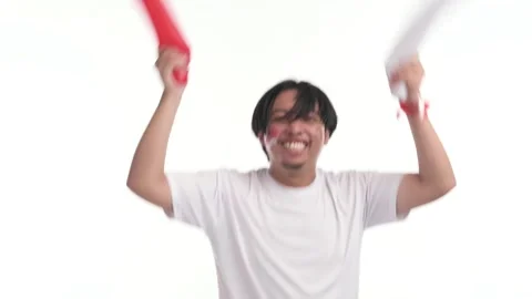 Indonesian man supporting with spirited expression Stock Footage 246835715