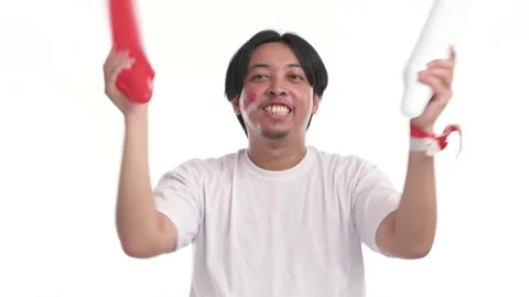 Indonesian man supporting with spirited expression Stock Footage 246835716