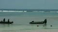 Indonesian military with rubber boat at the beach HD Footage
