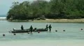Indonesian military with rubber boats at the beach HD Footage