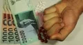 Indonesian Rupiah IDR, Counting Drugs and Money, Health Care, Colorful Pills HD Footage