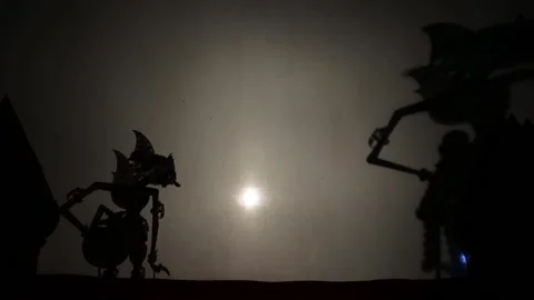 Indonesian shadow puppet show silhouette. Cultural Traditions in Java and Stock Footage 236014367