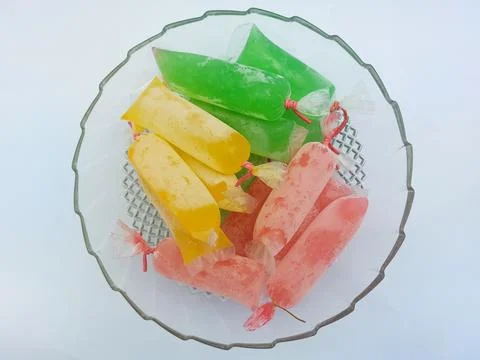 Indonesian simple ice is called Es Kenyot, available in various flavors. Stock Photos