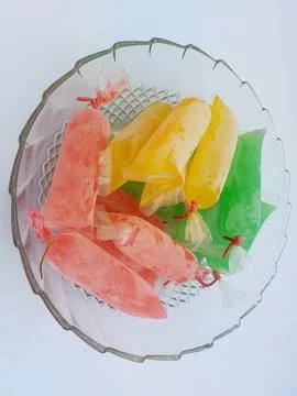 Indonesian simple ice is called Es Kenyot, available in various flavors. Stock Photos