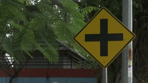 Indonesian traffic road sign, intersection ahead warning signage Stock Footage 137418879