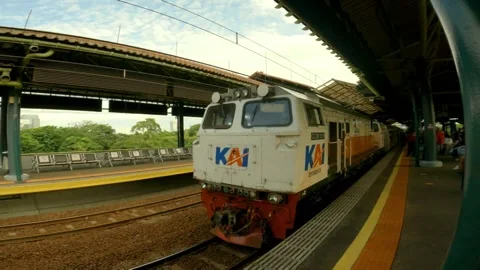Indonesian Train Named Argo Bromo Anggrek Is Passing at Gambir Station, Jakarta. Stock Footage 152844688