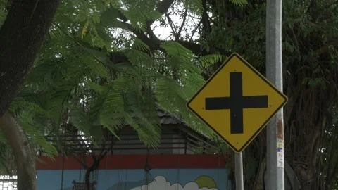 Indonesian warning signage, intersection ahead road sign Stock Footage 137419584