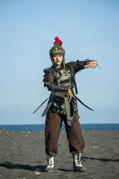 Indonesian warrior dance performance highlights Javanese heritage on Watu Pecak Stock Photos