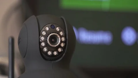 Indoor a Cctv IP wireless Security Camera with rotating head Stock Footage