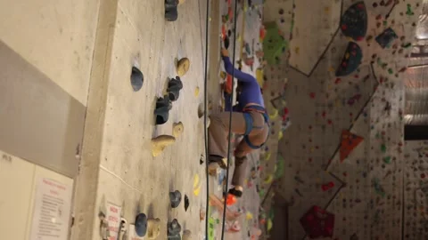 Indoor climbing training focused on grip strength. Stock Footage 339287799