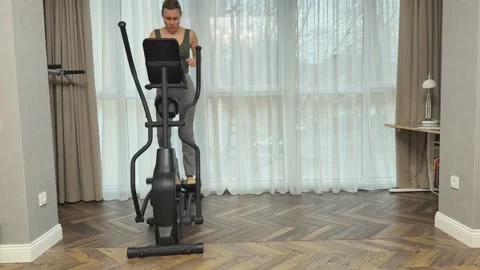 Indoor Exercise Routine With Controlled Resistance And Proper Form On Stock Footage 344249176
