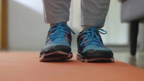 Indoor home workout concept, stretching legs Stock Footage 140058049