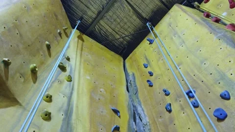 Indoor Rock Climbing Wall with Ropes and Pulley System – Static Shot Stock Footage 313873333