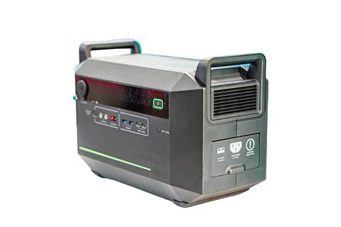 Indoor scene of a black, rectangular power station on a neutral gray backgr.. Stock Photos