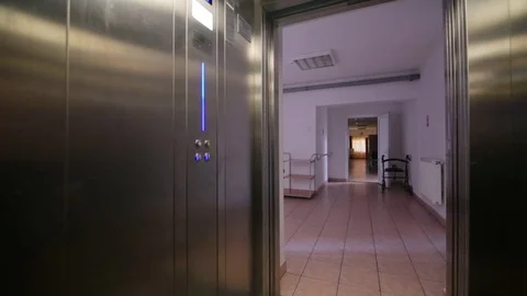 Indoor shot of an elevator door opening Stock Footage 109596977