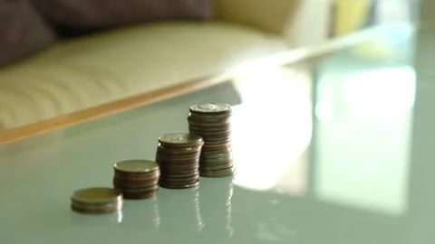 Indoor shot, selective focus at men hand put wooden house mock up beside incr Video stock 146363896