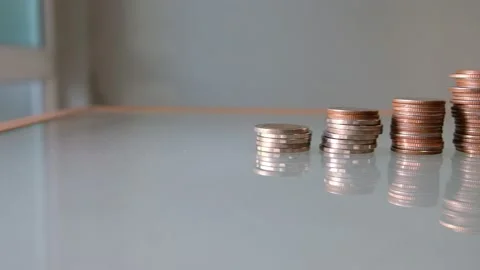 Indoor shot, selective focus at men hand put wooden house mock up beside incr Video stock 146363908