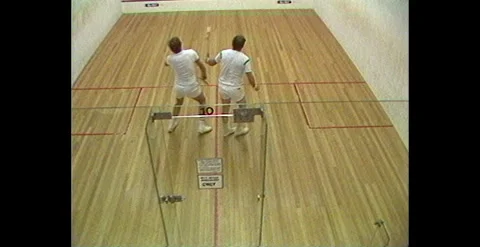 Indoor Squash Match – Two Men Competing in Australian Sports Centre (1984) Stock Footage 310438382