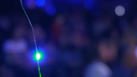 Indoor string lights hanging on a line in backyard. Stock. Garland blur Stock Footage 92138657