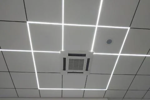 Indoor unit air conditioner. Ceiling version with LED backlight. Stock-Fotos