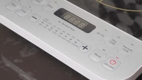 Induction cooker switch off Stock Footage 321406133