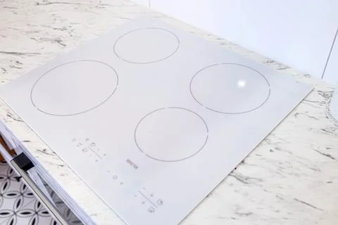 Induction cooker used in the kitchen Fotos de archivo