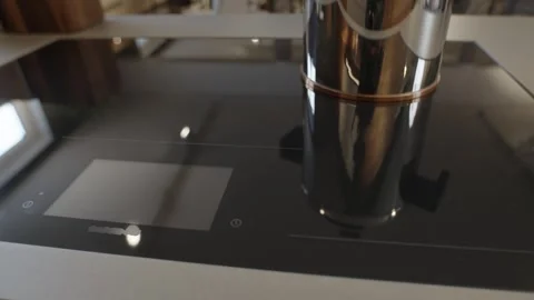 Induction Cooktop and Cylindrical Range Hood, Modern Kitchen, Close Up Shot Vidéo 341392656