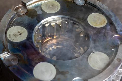Induction Heated Planetary Gearbox Component With Rising Vapor Indoors. Stock Photos