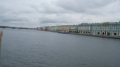 Indulge in the breathtaking river view of a charming historic European city on a Stock Footage 276477813