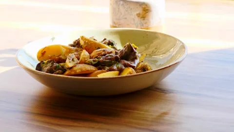 Indulge in a Delicious Stew that Features Fresh Vegetables and Hearty Meat Stock Footage 307996830