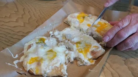Indulge in our Delicious pizza Flatbread topped with an array of Creamy Toppings Stock Footage 302186972