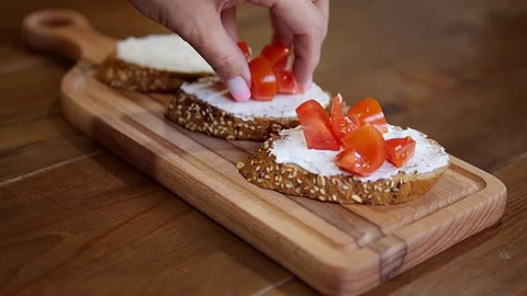 Indulge in the vegetarian's ultimate delight: crispy bread, luscious cheese, and Stock Footage 265151593