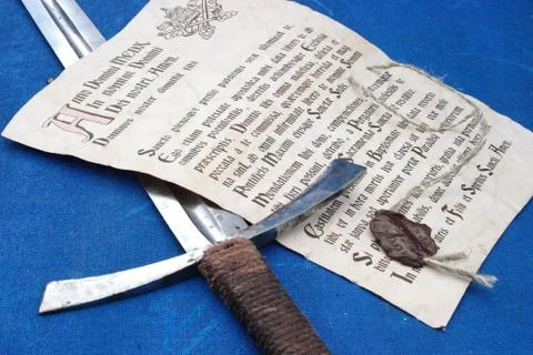The indulgence and the sword Stock Photos
