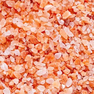 Indus himalayan pink salt abstract background. pink sea salt Stock Photos