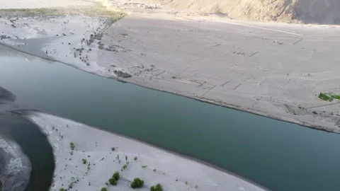Indus River flows between the Karakoram and Himalayas at Skardu, Pakistan Stock Footage 342022137