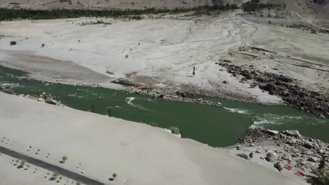 Indus River flows between the Karakoram and Himalayas at Skardu, Pakistan Stock Footage 342022344