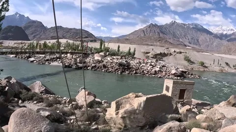Indus River flows between the Karakoram and Himalayas at Skardu, Pakistan Stock Footage 342022433