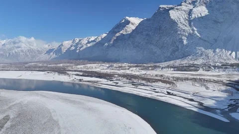 Indus River Surrounded by Mountain Landscape, Pakistan skardu in winters Stock Footage 345786559
