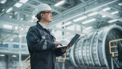 Industial Engineer Working on Laptop in Factory Stock-Footage 150378614