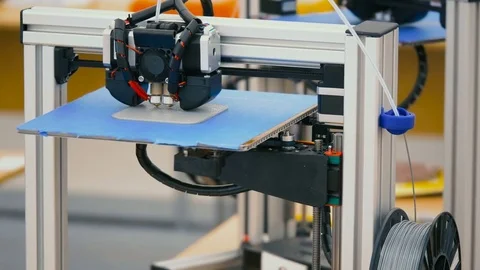 Industrial 3D Printing.The printer prints a 3D prototype parts modeled on the Stock Footage 78627195